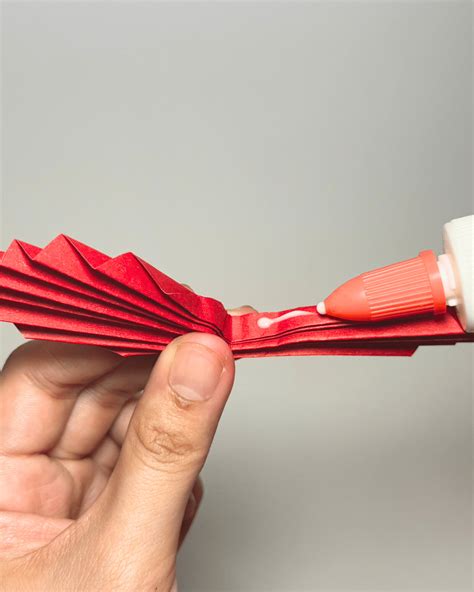 how to fold paper hearts 8