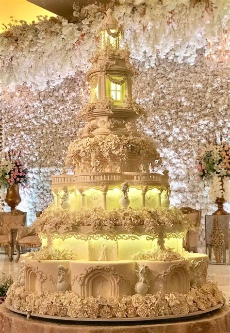 Huge intricate wedding cake. Rosebud cakes. | Beautiful wedding cakes