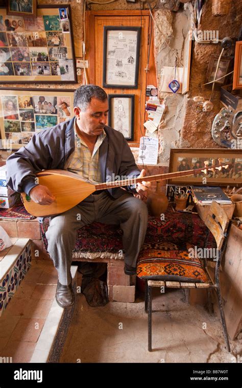 Turkish musician play typical Turkish string instrument in Avanos ...