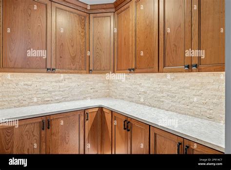 The modern wood kitchen with a marble counter Stock Photo - Alamy