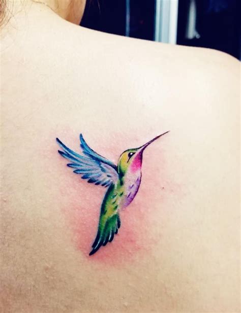 Hummingbird tattoo | Hummingbird tattoo black, Small hummingbird tattoo ...