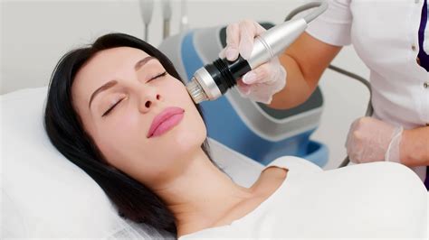 Micro-Needle RF Lifting Neck Skin. Caucasian female getting RF lifting
