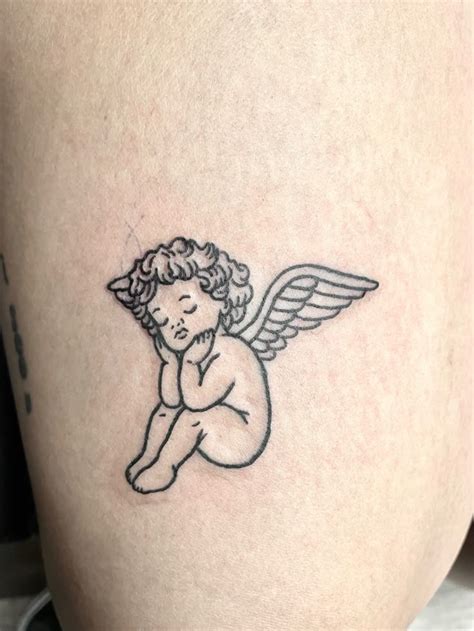 Angel Tattoo Cherub Tattoo | Cherub tattoo, Cupid tattoo, Angel tattoo ...