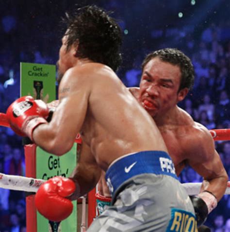 Pacquiao's loss downs spirit of storm-hit Filipinos - Sports Illustrated