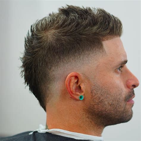 bold  edgy mastering  art  mohawk hairstyles  males