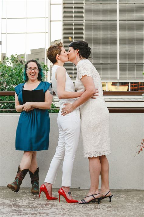 Colorful outdoor rooftop lesbian wedding in Austin, Texas