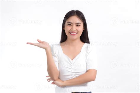 Asian girl with black long hair wearing a white shirt and pretty