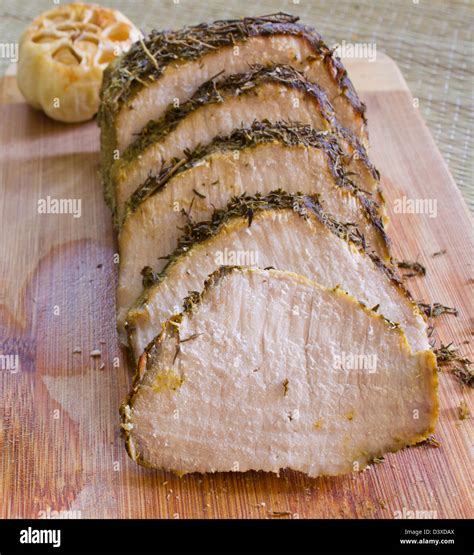 Pork loin herbs and garlic Stock Photo - Alamy