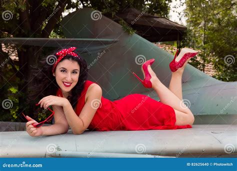 Elegant Pin-up Model on WW2 Airplane Wing Stock Photo - Image of