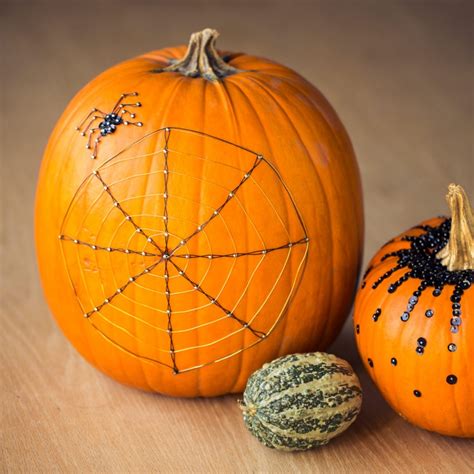 DIY Wire Web Pumpkin For Halloween Decor - Shelterness