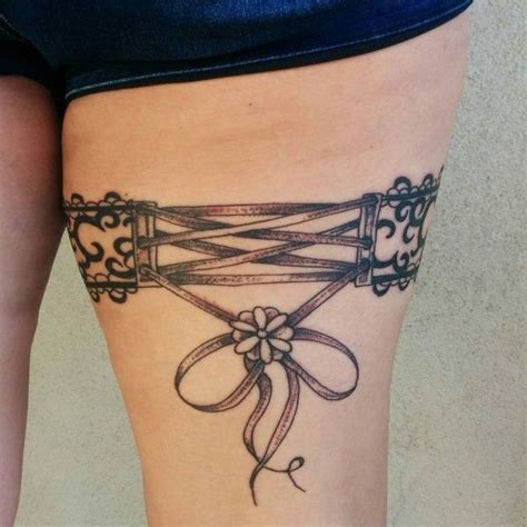 garter tattoo  dagger symbolism  design inspiration