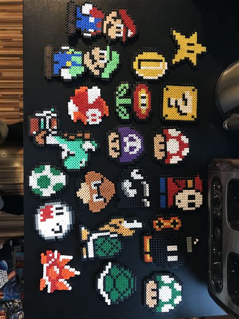 an array of pixelated video game characters are displayed on a black ...