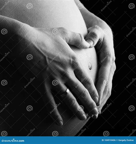 Pregnant Woman Belly, Holds One Hand a Heart Shape Stock Photo - Image