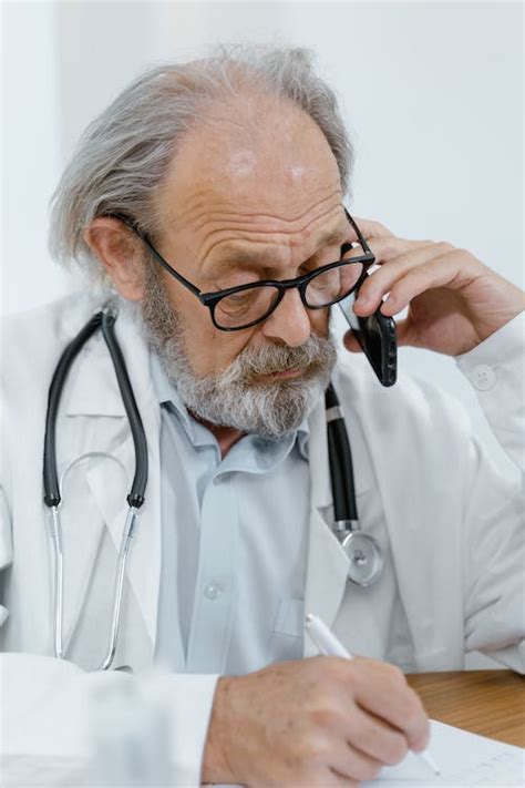 Doctor Talking on the Phone · Free Stock Photo