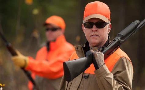 hunters wear daylight fluorescent orange clothing