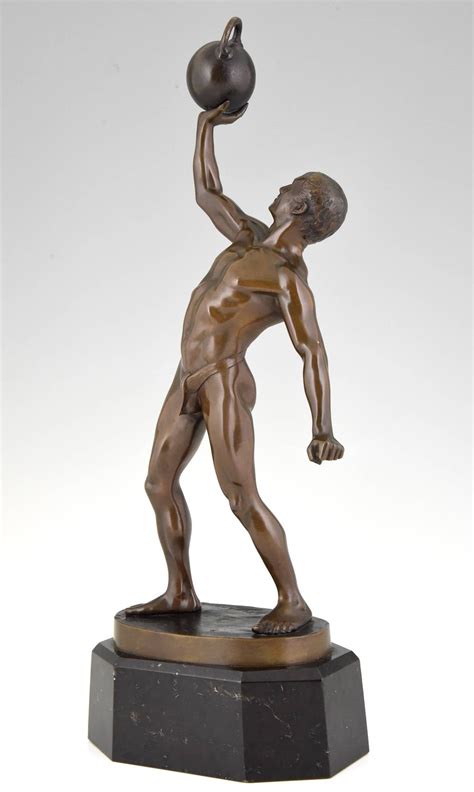 Antique Sculpture of a Male Nude Athlete with dumbbell by Peleschka