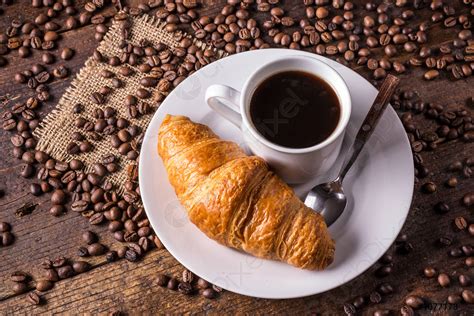 Coffee and croissant - stock photo | Crushpixel