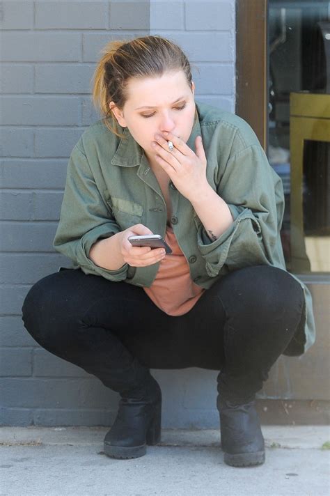 Abigail Breslin - Enjoys a Cigarette in West Hollywood 6/25/2016