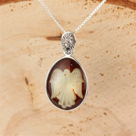 Carved Angel Pendant In Cherry Baltic Amber Sterling Silver