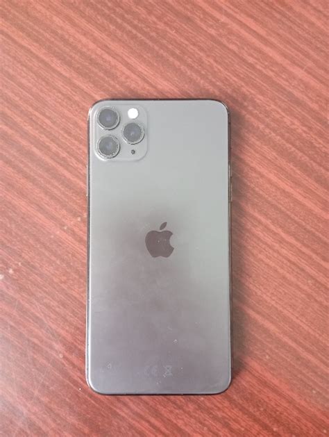 Телефон марки IPhone 11 Pro Max, у корпусі чорного кольору, бувший у ...