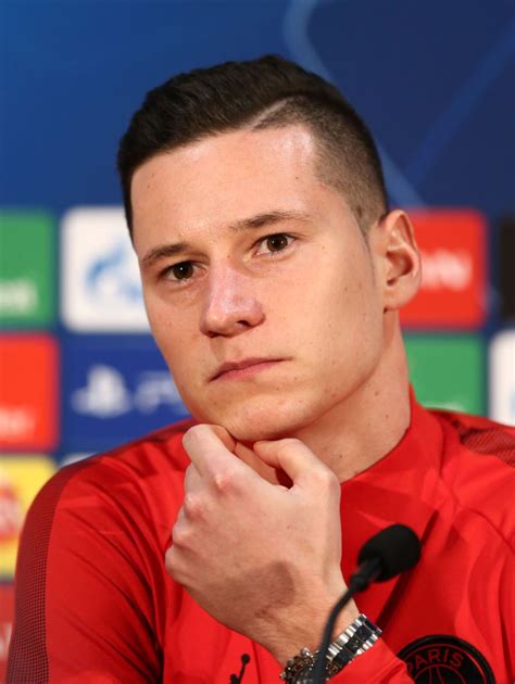 Julian Draxler looks on during a Paris Saint-Germain press conference ...