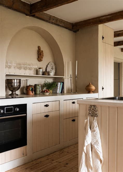 This Swedish country house is all about antiques and cosy textiles ...