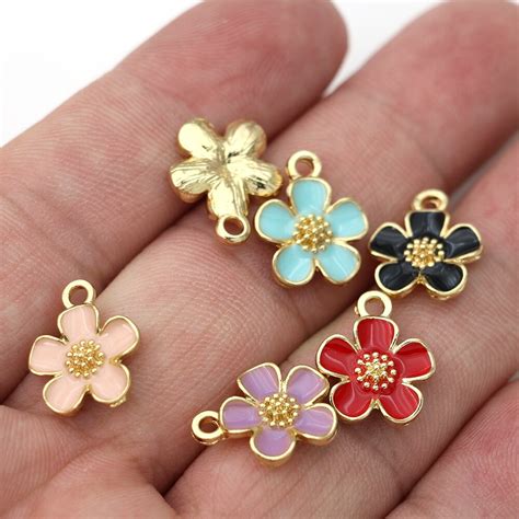 st emalj guld faerg rosa blomma berlock haenge foe vicedeal