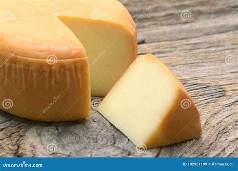 cheese wheel  knife stock image cartoondealercom
