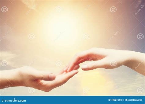 Soft, Gentle Touch of Man and Woman Against Sunny Sky Stock Photo ...