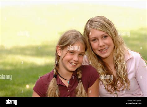 Portrait of young girls on grass, Regina, Saskatchewan Stock Photo - Alamy