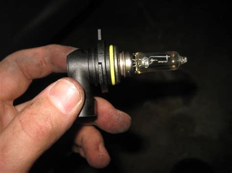 how to change chrysler 200 headlight