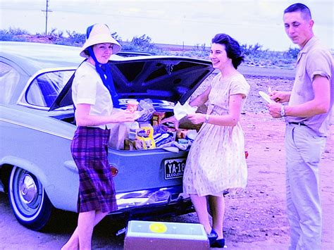 1962. My mother-in-law Patricia (far left) having a roadside picnic