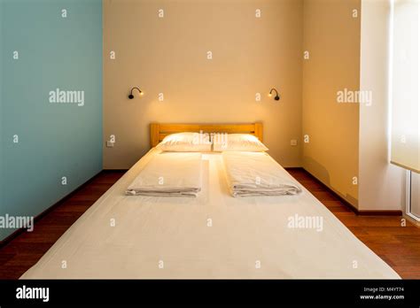 Double bed in the hotel Stock Photo - Alamy