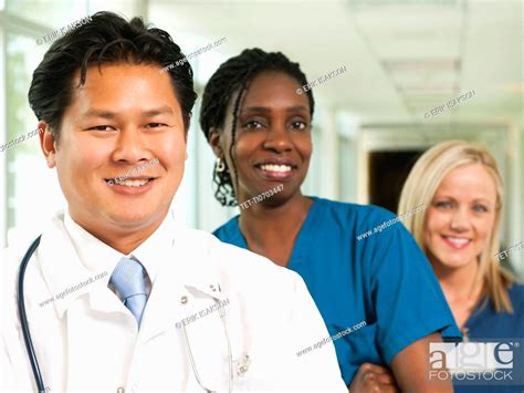 Doctor and two nurses posing for portrait, Stock Photo, Picture And ...