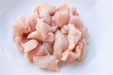 cut finger cutting raw chicken 1