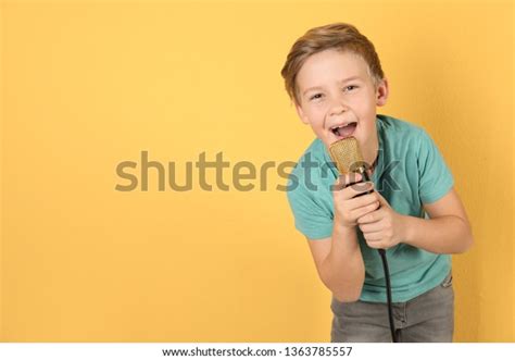young boy singing   royalty  licensable stock