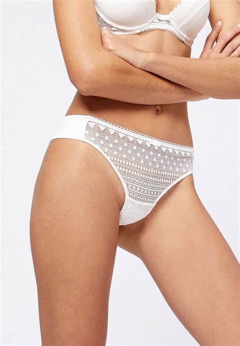 Трусы Etam MOVE - TANGA, цвет: белый, ET006EWGQPZ9 — купить в интернет ...