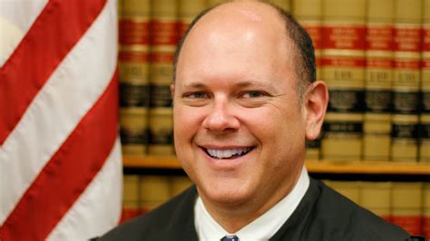 Who is Justice Matthew Rosenbaum and why has he stepped down?