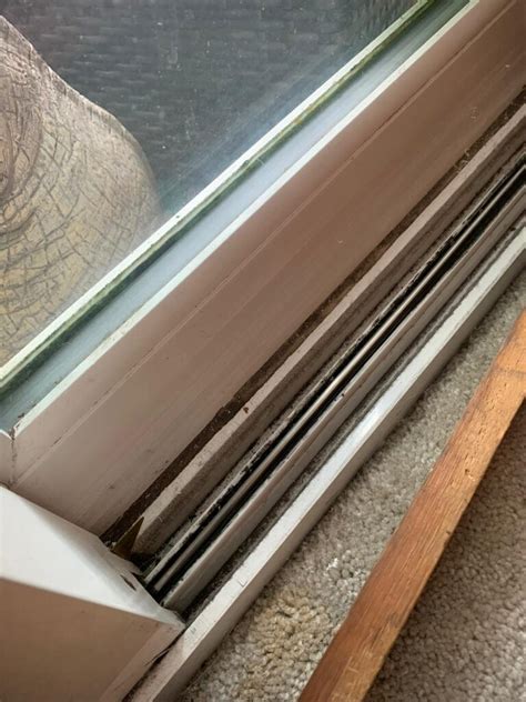 how to fix a sliding door track