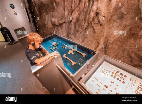 22 July 2022, Dusseldorf, Germany: Kid learning and listening ...