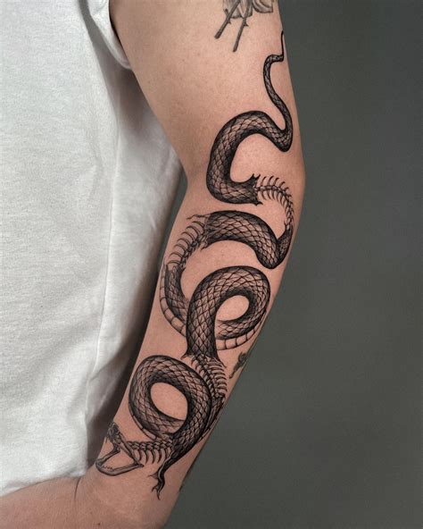 Snake Tattoo Meanings + 52 Designs that take your breath aw