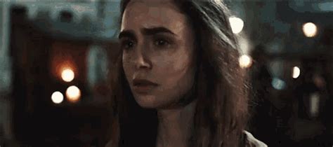 lily collins sad gif