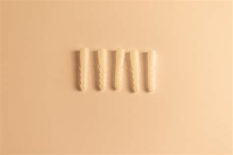 Premium Photo | Wall plug or screw anchor with selective focus