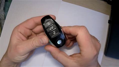Замена батарейки в ключе TOUAREG NF.Replacing the battery in the key ...