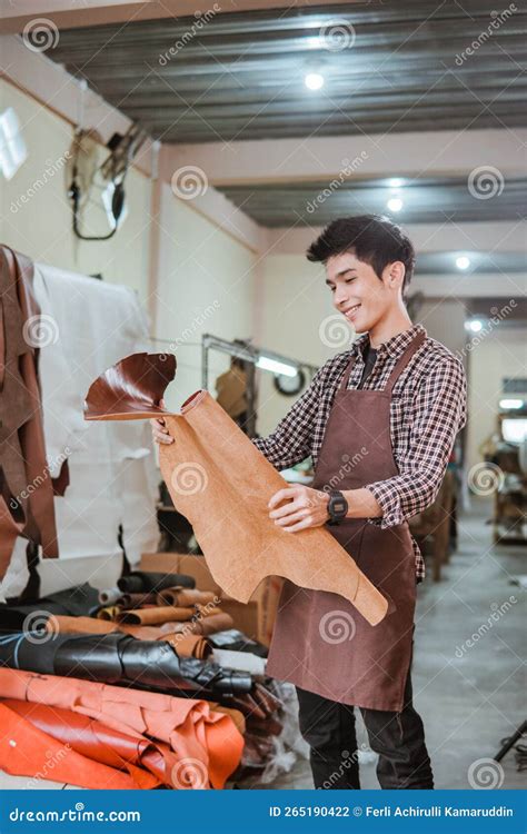 Craftsman Take Tanned Leather from Leather Craft Materials Stock Photo ...