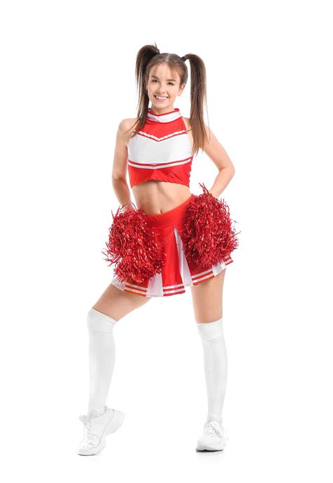 Premium Photo | Beautiful young cheerleader isolated