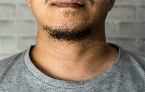 man asia with a long beard on the chin close up 24604531 Stock Photo at ...