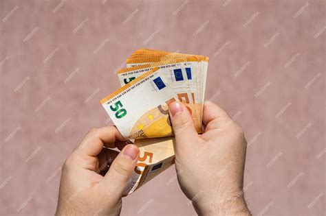 premium photo close   woman holding hands  wall