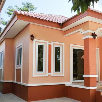 Теракотовий колір штукатурки TRAVERTINO для фасаду будинку