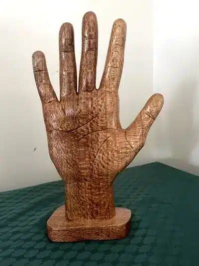 hand carved wooden hand  palm lines carved  sari destiny palmistry